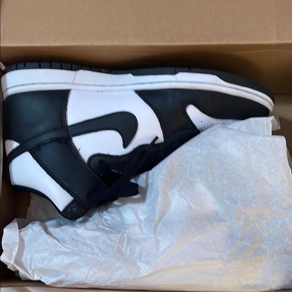 Women’s Black and White Nike Sneakers